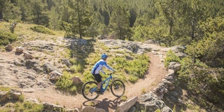 A mountain biker descends a trail at Edness K. Wilkins State Park near Casper, WY