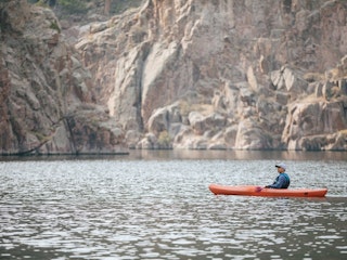 A Man In A Kayak at Alcova Lake In Casper, WY