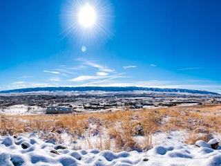 Snowy landscape on a bluebird day in Casper, WY