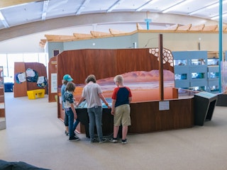 Family and child at an Science Zone exhibit in Casper, WY