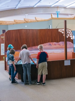 Family and child at an Science Zone exhibit in Casper, WY